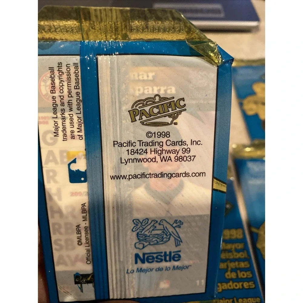 1998 Pacific Nestle Unopened Packs (7). HOF Visible On Back P. Martinez & Others